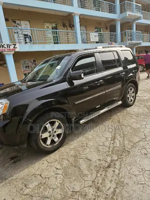Honda Pilot Touring w/RES/Navi 4WD (3.5L 6cyl 5A) 2011 Black