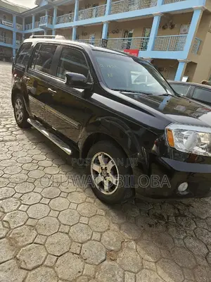 Honda Pilot Touring w/RES/Navi 4WD (3.5L 6cyl 5A) 2011 Black