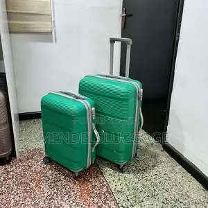 3-piece Green Ribbed Suitcase Set With Spinner Wheels