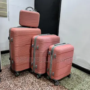 4-Piece Pink Spinner Suitcase Set With Hard-Shell Design