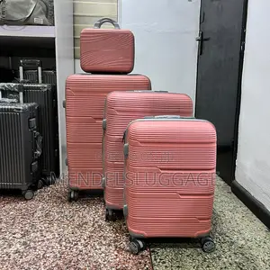 4-Piece Pink Spinner Suitcase Set With Hard-Shell Design