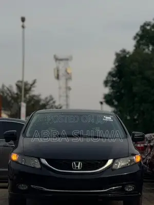 Honda Civic EX-L w/Navigation 2dr Coupe (1.8L 4cyl CVT) 2015 Black