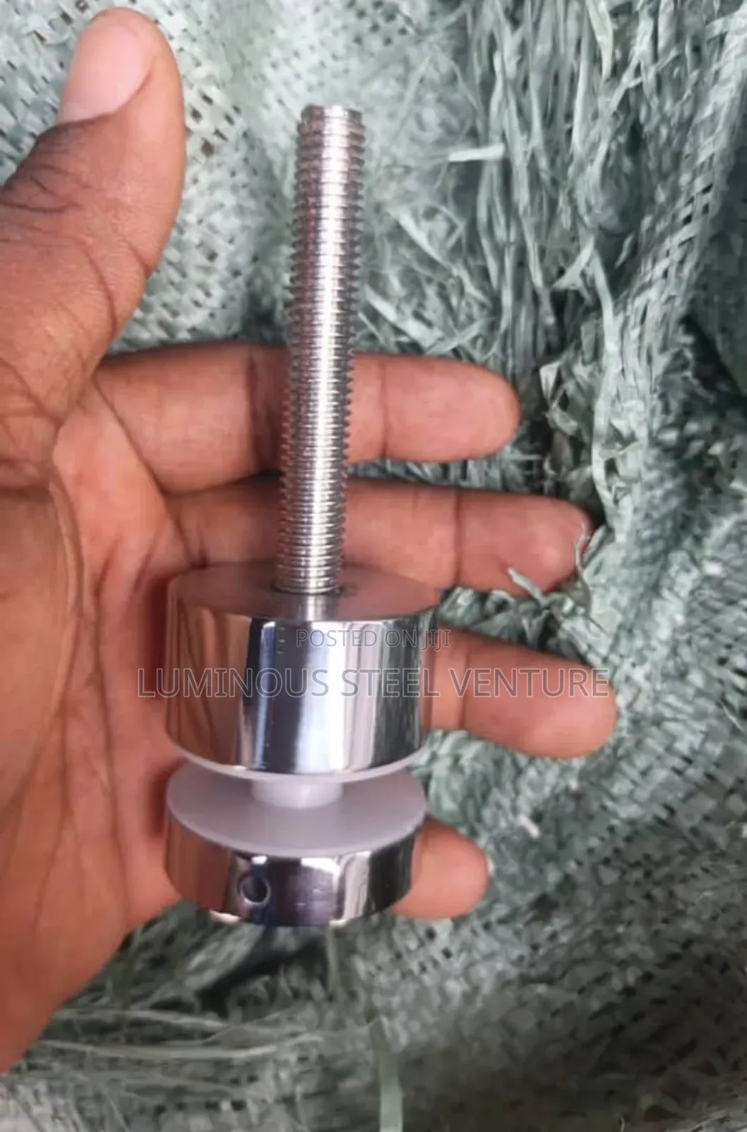 A High-Performance, Cylindrical Fastener Designed to Secure Glass
