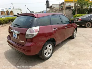 Toyota Matrix XR Hatchback AWD (1.8L 4cyl 4A) 2006 Red