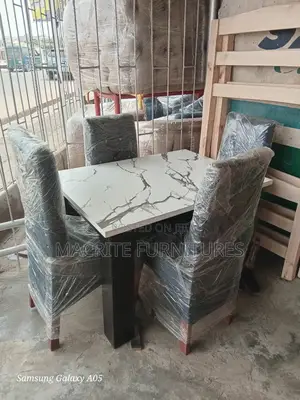 A Brand-New New Marble Colour Top Dining Table 4-Set