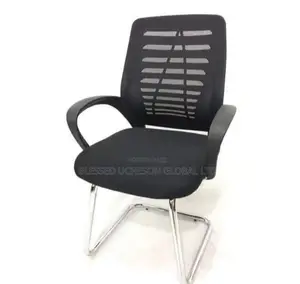 Black Mesh Office Visitor Chair With Sled Base and Armrests.