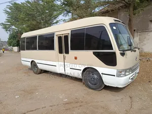 Toyota Coaster 2010 Gold