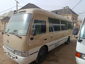 Toyota Coaster 2010 Gold