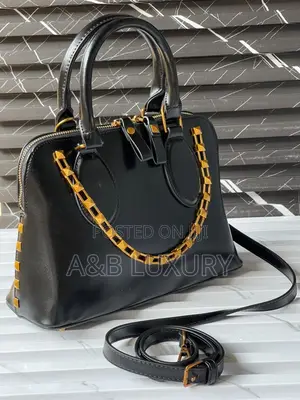 Stock Rockstud Top-Handle Bag