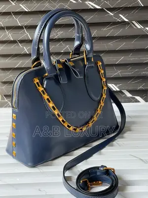 Stock Rockstud Top-Handle Bag
