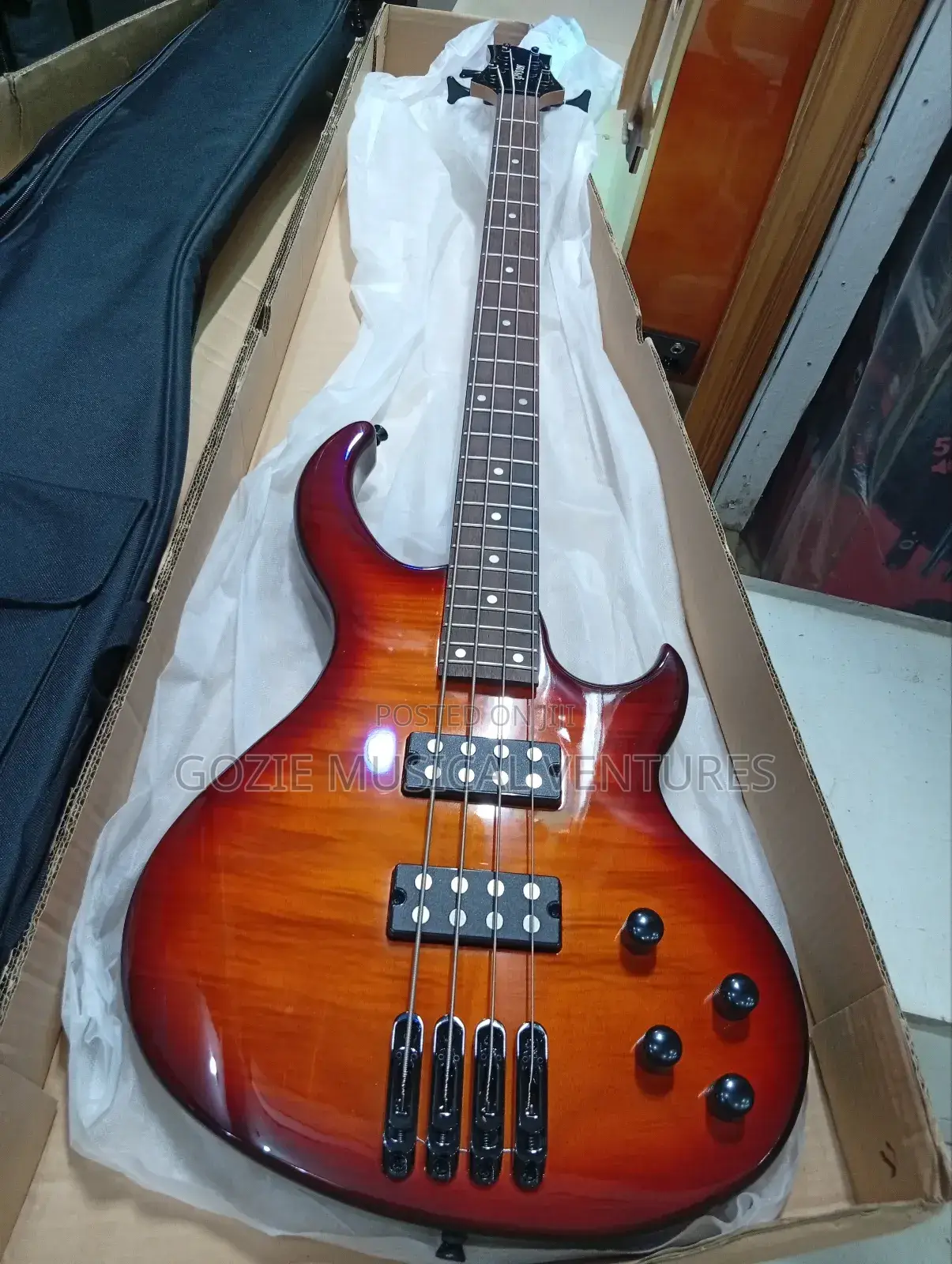 Givson Four String Active Bass Guitar With Bag and Strap.