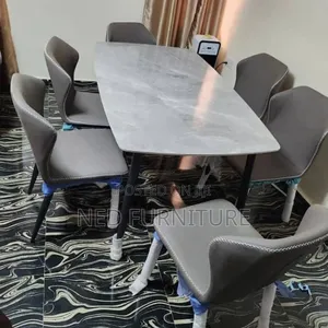 Quality Marble Top Dining With 6 Leather Gray Chiars