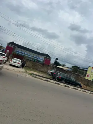 An Acre of Commercial Land, With a Duplex, Warehouse in Oluyole