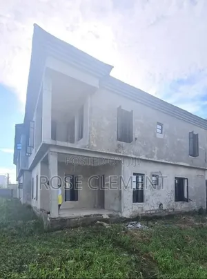 An Uncompleted Duplex and 4 Flats for Sale