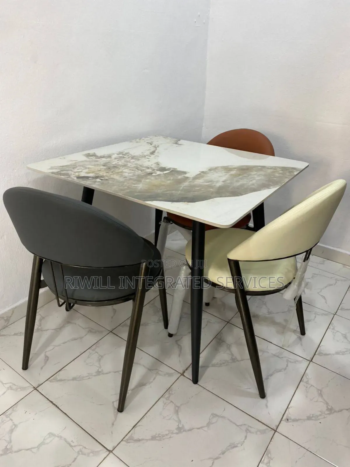 Three Chairs With a Table