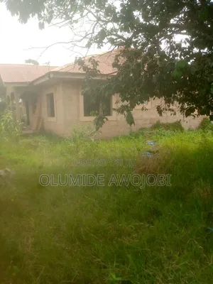 A Plot of Land With a Building at Onibuku Ota Ogun State for Sale