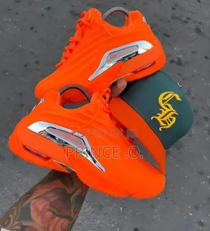 Luxury Orange  Drake Nocta Sneakers
