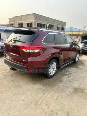 Toyota Highlander LE Plus V6 4x4 (3.5L 6cyl 6A) 2016 Burgundy