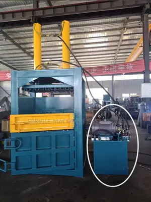 Automatic Bailing Machine