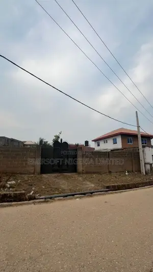 A Fenced and Gated Commercial Land Opposite I-Cast School, Elebu