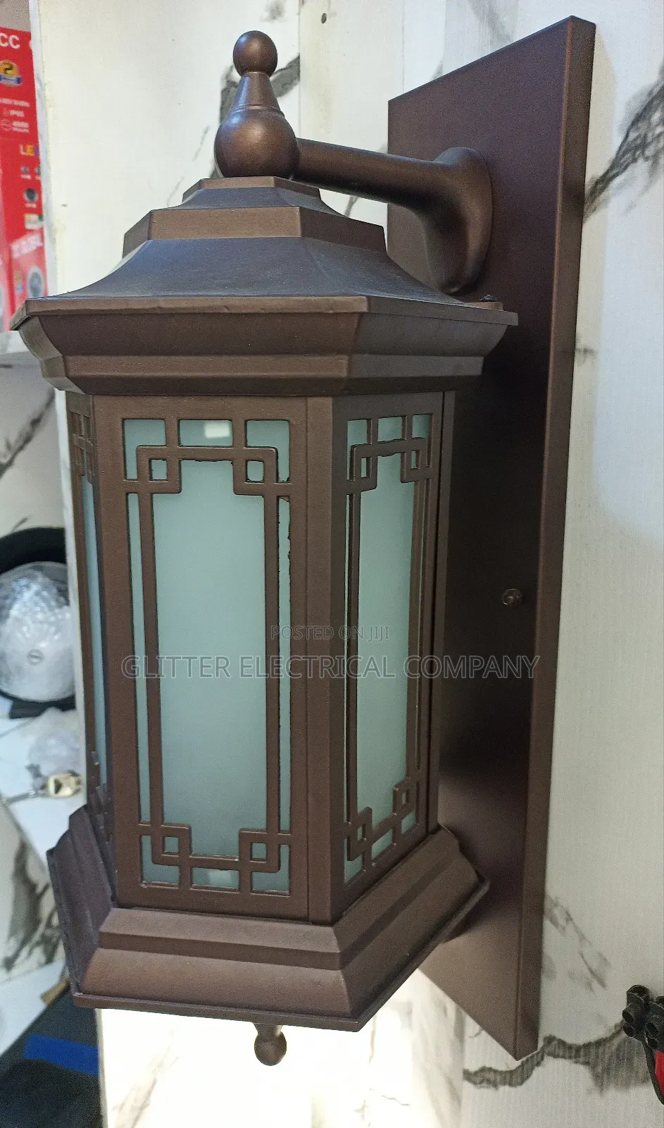 Unique Wall Light for Gate Piller.