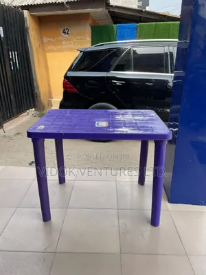 Plastic Table With Central Hole for Business and Home Use.