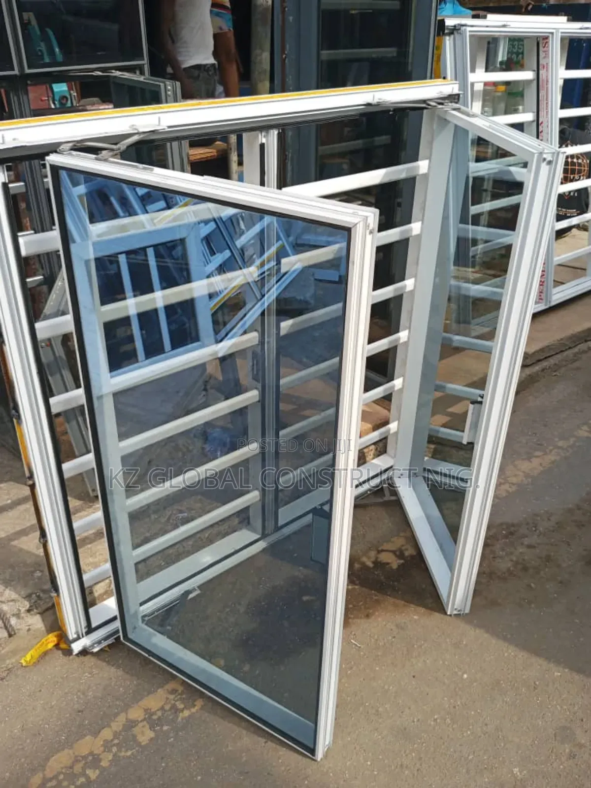 Frameless Window With Burglary and Net