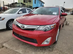 Toyota Camry LE 4dr Sedan w/Prod. End 11/13 (2.5L 4cyl 6A) 2014 Red