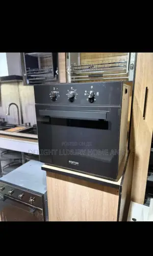 Oven Electric and Gas It Is Being Used in the Kitchen