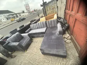 A Standard Soft Grey Parlor Couch