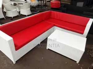 Red And White L-shaped Plastic Sofa With Centre Table