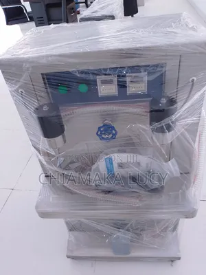 Double Nozzle Liquid Filling Machine