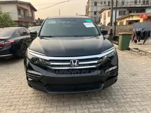 Honda Pilot Touring 4dr SUV 4WD (3.5L 6cyl 9A) 2017 Black