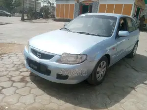 Mazda 323 2002 Blue