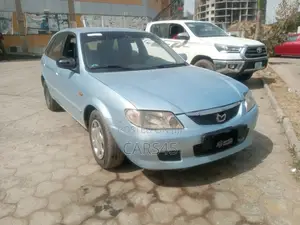 Mazda 323 2002 Blue