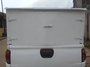 Mitsubishi L300 2014 White