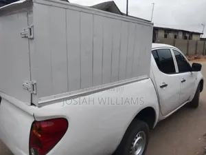 Mitsubishi L300 2014 White