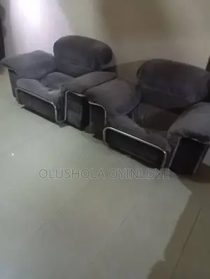 One Three Seater Chair and 4 Single Chairs