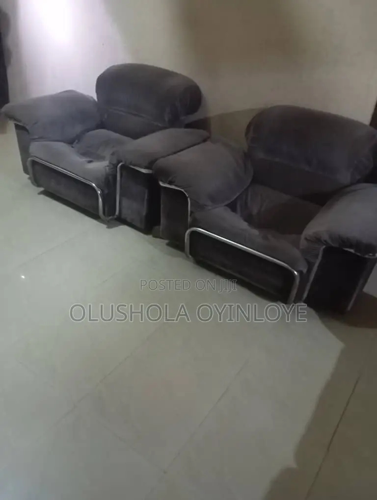 One Three Seater Chair and 4 Single Chairs
