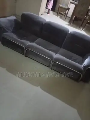 One Three Seater Chair and 4 Single Chairs