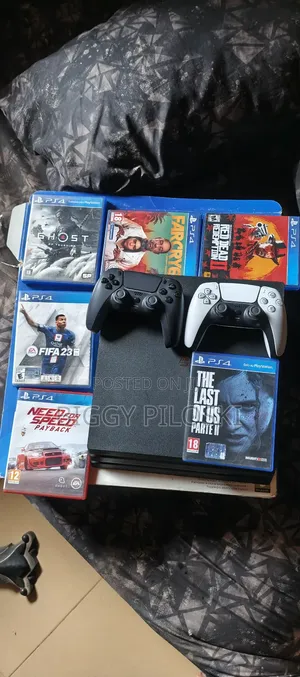 Ps4 Pro With 6 Games and 3 Original Controllers