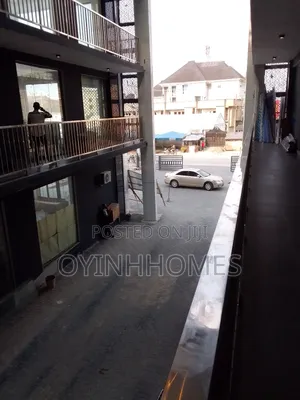 Shop on Second Floor Facing a Busy Road