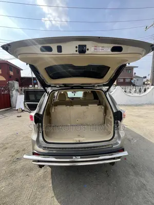 Toyota Highlander XLE 4dr SUV (3.5L 6cyl 6A) 2015 Gold