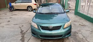 Toyota Corolla Base 4dr Sedan (1.8L 4cyl 5M) 2010 Green