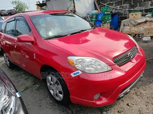 Toyota Matrix Hatchback AWD (1.8L 4cyl 4A) 2006 Red