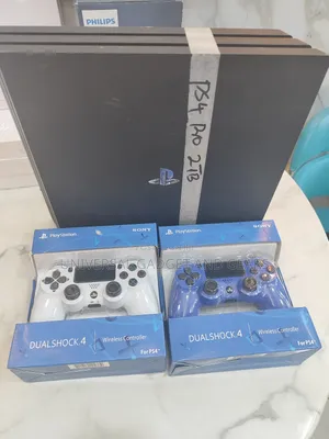 Ps4 Pro 2tb ( 2 Controller Pads) Uk Used