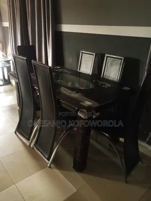 Clean and Used Dining Table With 6 Chairs
