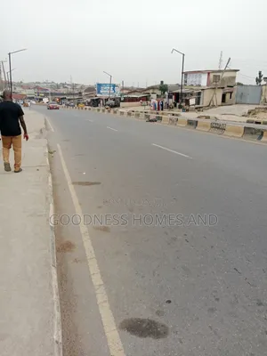 Half Plot Facing the Tarred Road in a Good Commercial Area