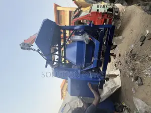 Concrete Mixer With Hoist With Wheel Barrow