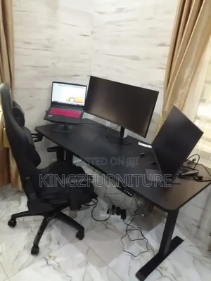 An Electric Height Adjustable Desk 1.6meter With Game Chair